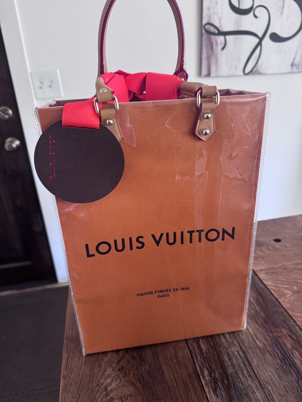Louis Vuitton Brown Clear Tote with Red Ribbon Accent 14”x10”